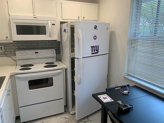 2nd image of 9081 Lime Bay Boulevard #214