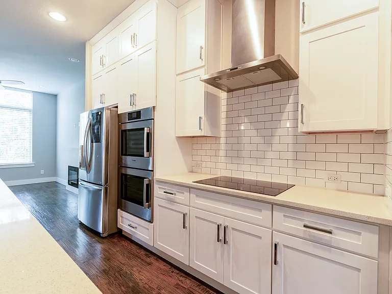 2nd Floor: Kitchen with Double Oven, Dishwasher, Refrigerator and Electric Stove Top