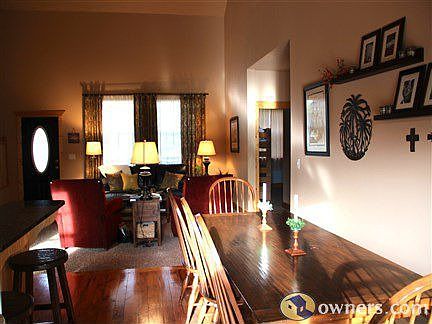 Great room: vaulted ceiling, reclaimed wood floors