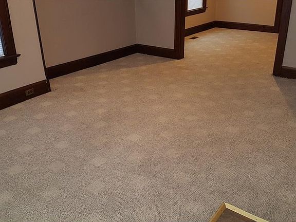 FIRST FLOOR EAST LIVING ROOM AND DINING ROOM