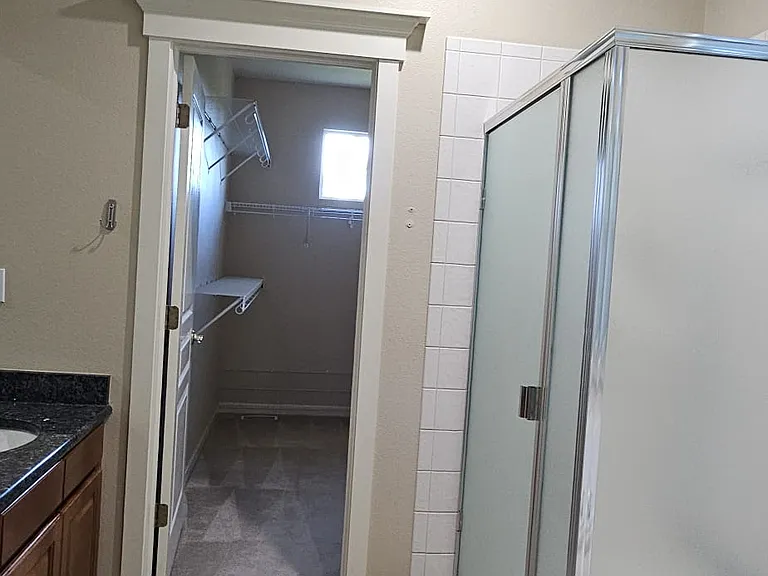 Master bath with walk in closet