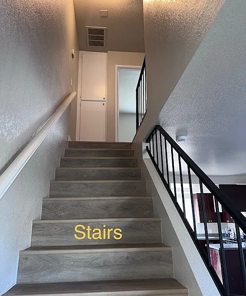 "Interior stairs providing access to second floor."