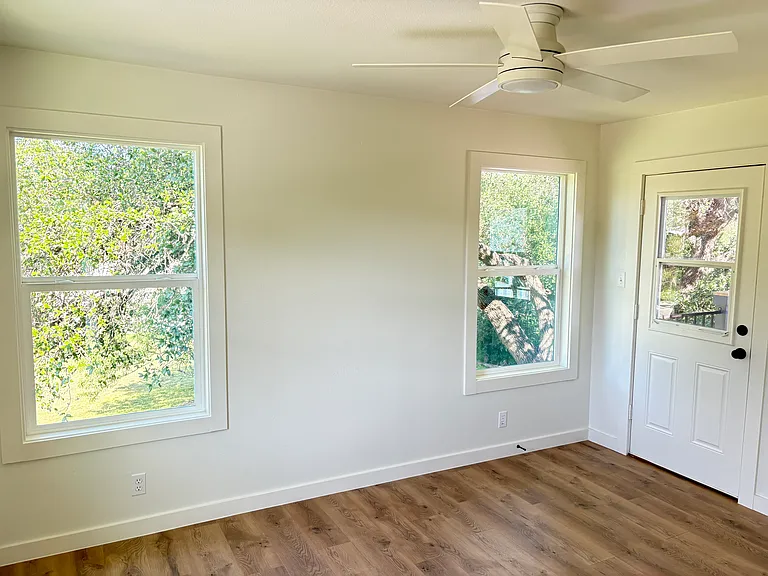 Bedroom 1, small balcony off of bedroom, 3 large windows, great. natural light