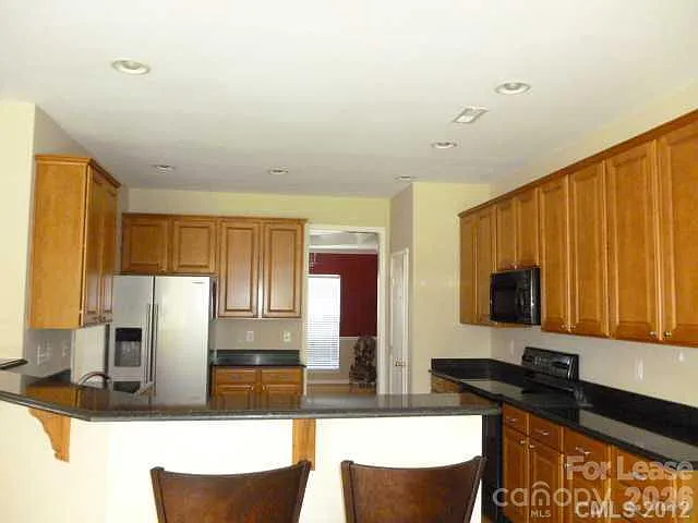 2612 Sunberry Ln NW — Photo 5