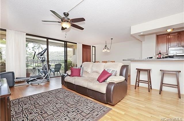 Large living and dining room area that flows to lanai.