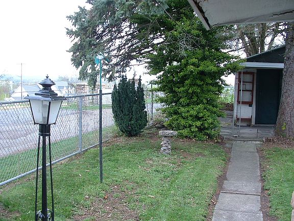 walkway to garage and patio.