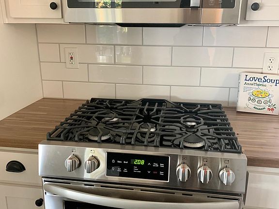 Newer Stainless Steel gas range and microwave