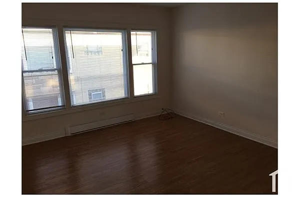 Building Photo - 5921 W Fullerton Ave #8