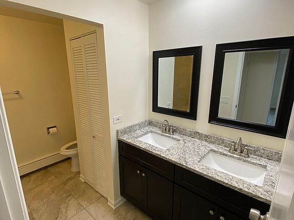 Double vanity sink with granite countertop