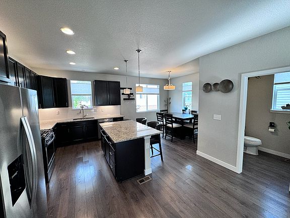 Kitchen, dining area and main level bathroom