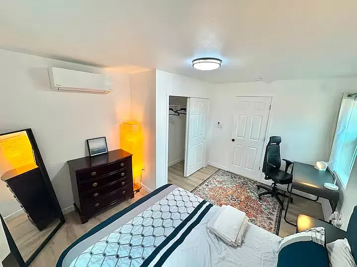 Private Bedroom: Relax in a newly furnished queen bedroom, air conditioning, workspace, and spacious wardrobe.