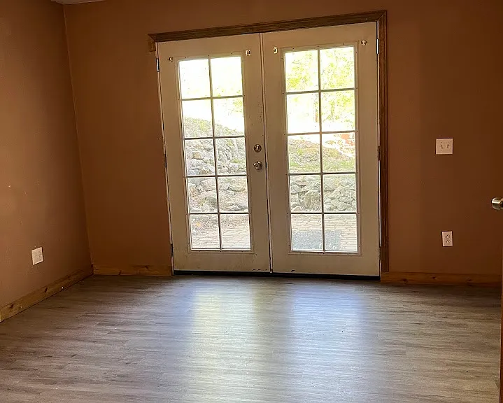 Downstairs work room/study with walk-out.