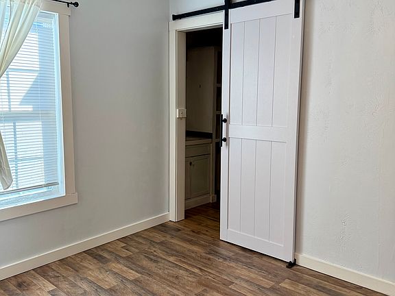Bedroom with full bathroom