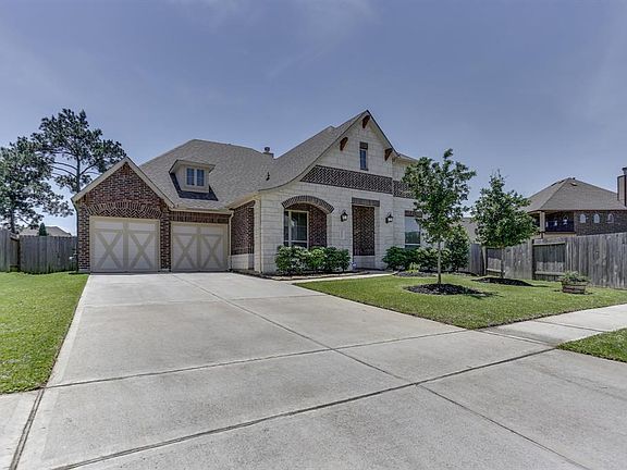 House is located in the prestigious Legends at Gleannloch, a gated section within the highly sought after Gleannloch Farms community.