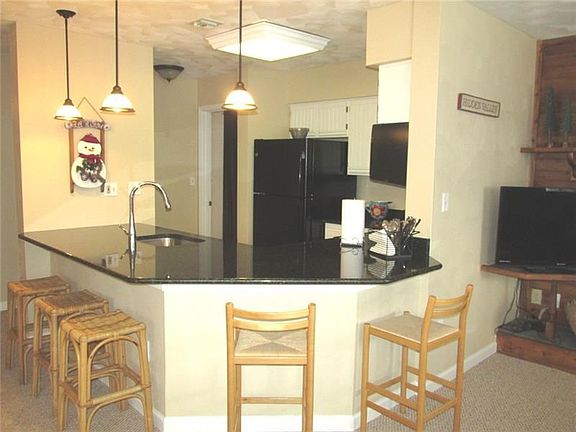 Fridge, stove, and dishwasher have all been upgraded along with the faucet and lighting.