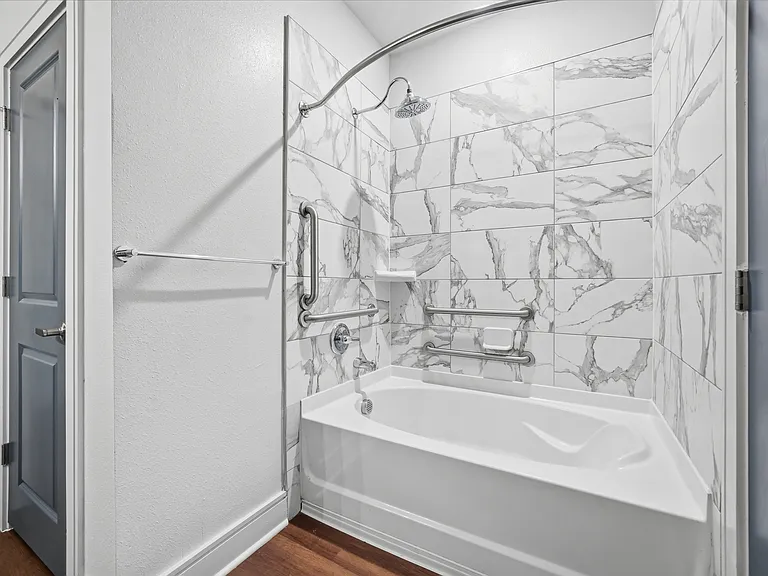 Modern apartment bathroom with a relaxing tub