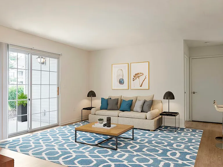 Renovated Package I living area with hard surface flooring