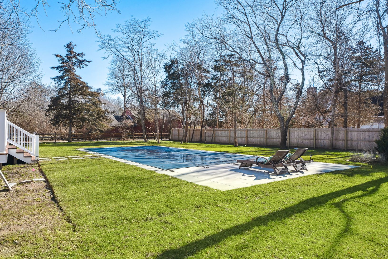  18x40 heated saltwater pool with blue ice stone work 