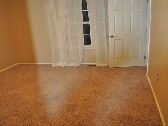 guest bedroom with 2 closets