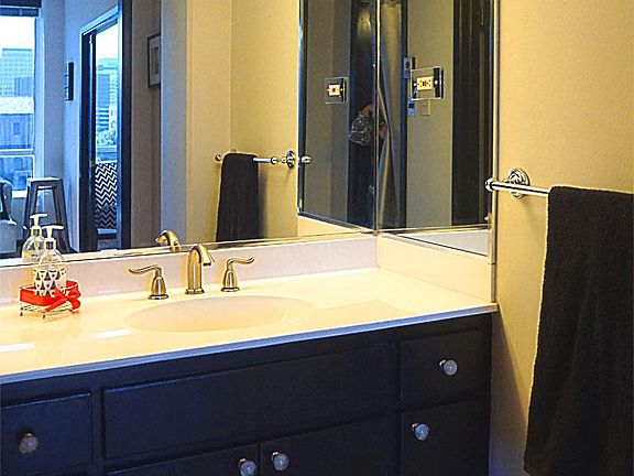 Restroom Vanieties offer Storage, Lots of Light, and Mirrors