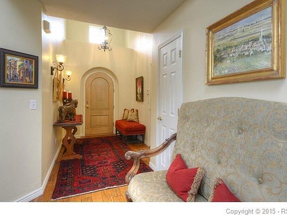 The large foyer welcomes you in with style and many architectural details