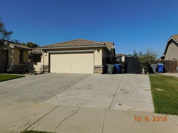 Extra Off Street parking with RV Access and custom Iron gate.