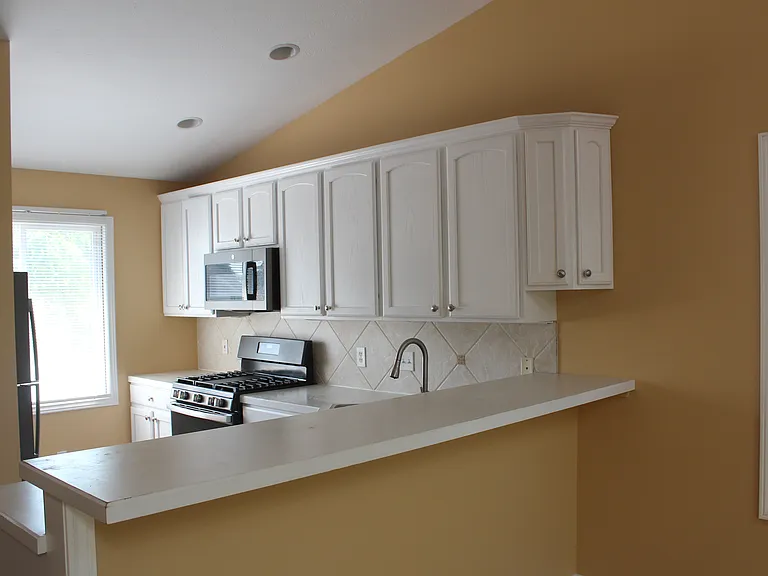 Kitchen, currently being remodeled with granite countertops and new backsplash