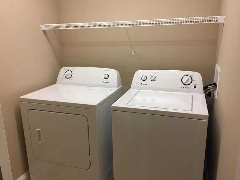Second level laundry room with washer/dryer