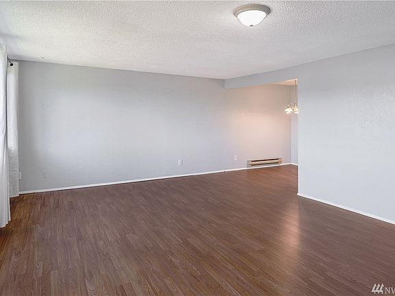 Large open space leads into the dining space. 