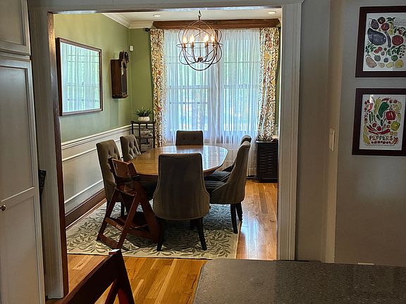 View of dining room from kitchen with island in foreground