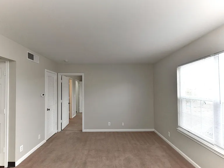 Bedroom with carpet