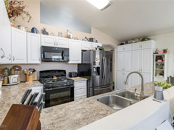 4th image of 7132 Old Village Ave