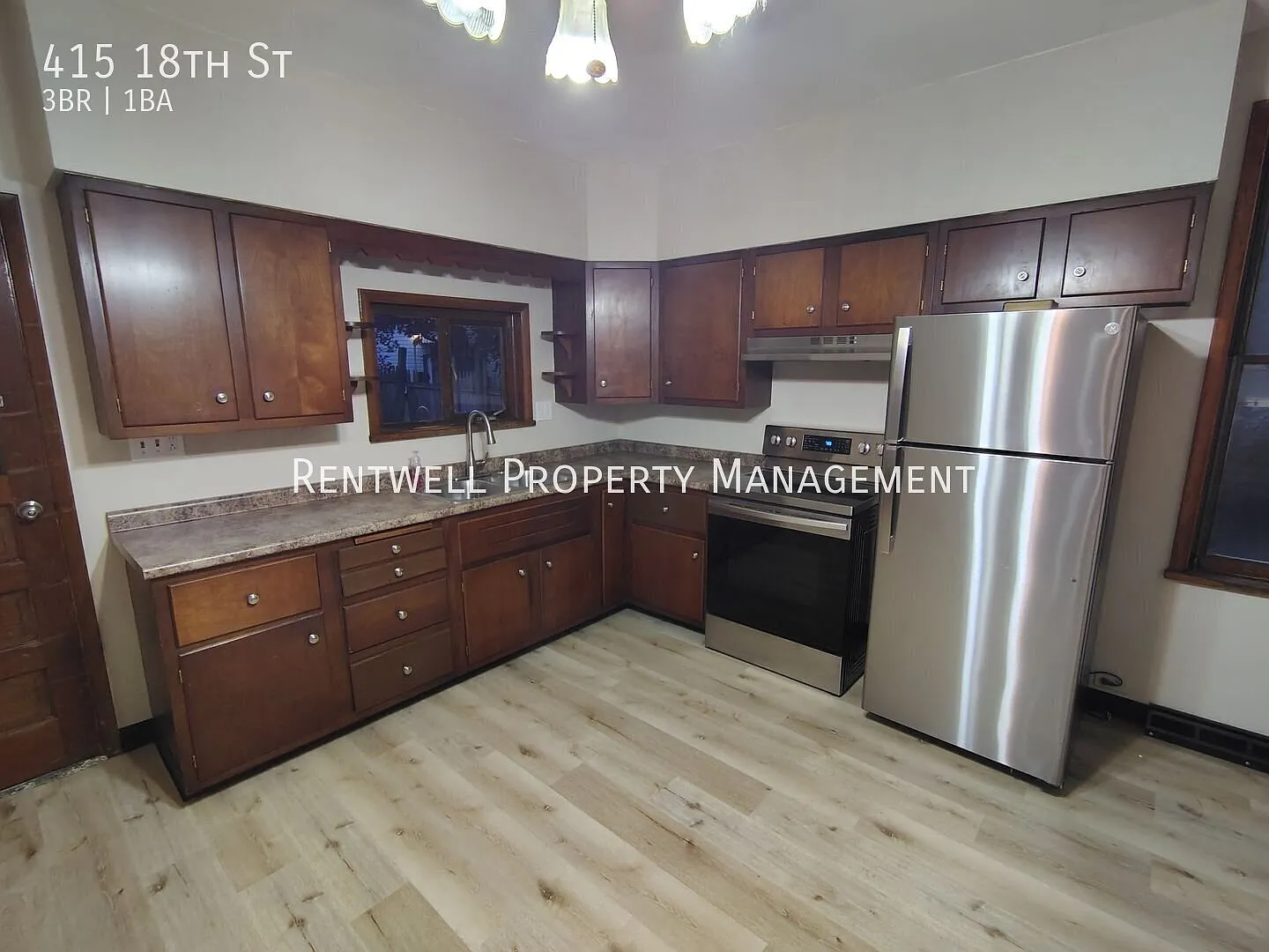 Charming 3-Bedroom Home with Hardwood Floors & Original Character — Photo 3