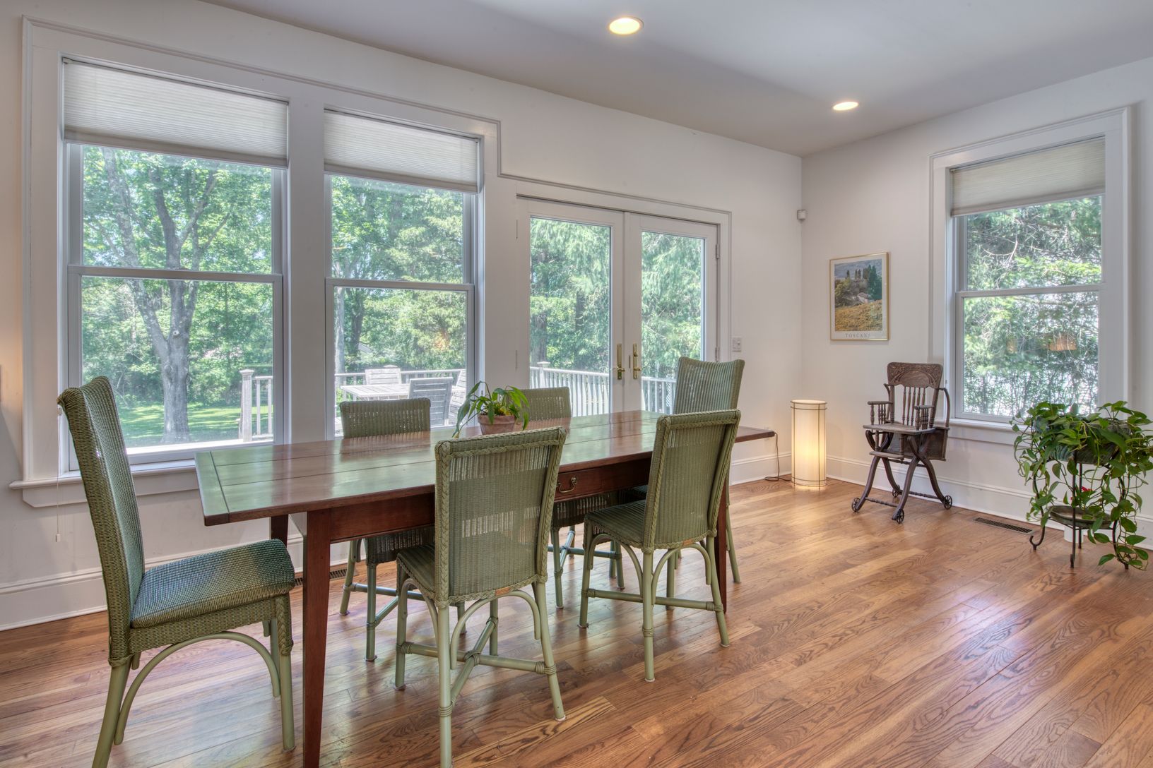 Dining area overlooking landscaped back yard
