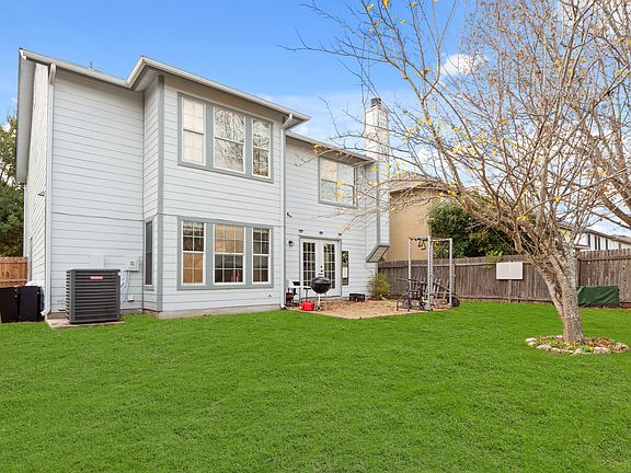 Spacious back yard for grilling, exercise or relaxing.