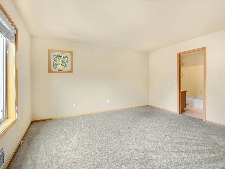 Bedroom 1 w/ ensuite bath and walk in closet
