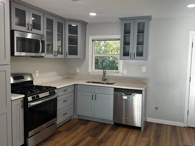 New Cabinetry and Granite Counters in the kitchen area. Stainless steel appliances and a gas stove!
