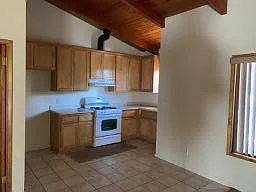 KITCHEN AREA OFF OF LIVING ROOM.