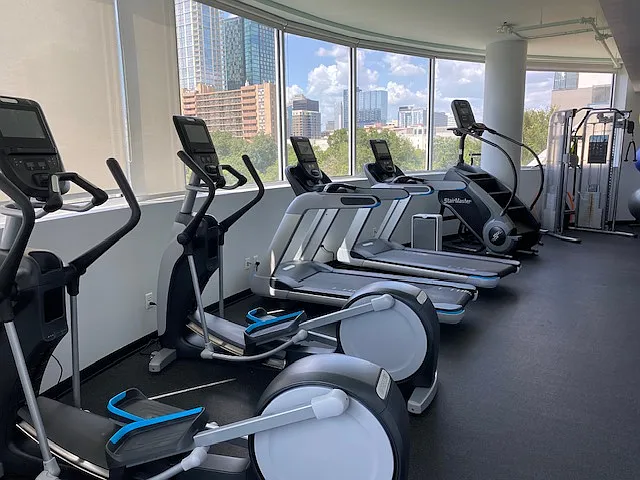 This is the fitness center, onsite, just two floors down from the unit; the reserved parking space (in the controlled entry garage) is just one floor down from the unit, accessible by elevator or stairs.