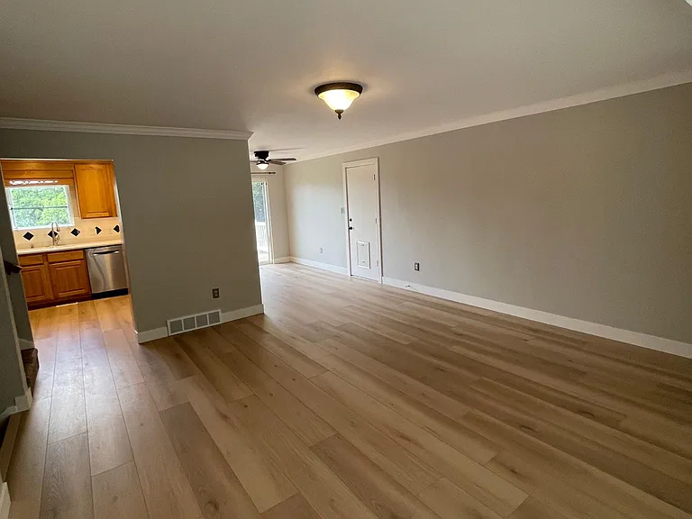 upstairs living room. semi open to dining area and kitchen.