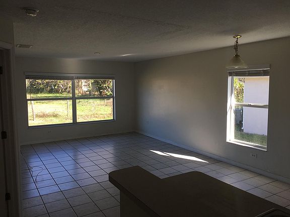 View of living room and dining room from kitchen.
