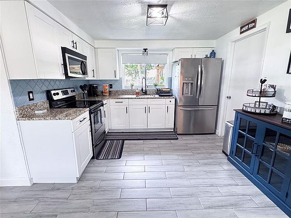 3rd image of 9616 Pine Ridge Ave