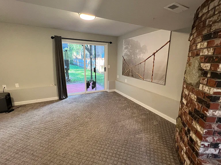 Lower Level Living/Rec Room Photo 4