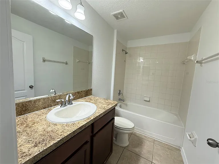 10713 Savannah Landing Cir — Photo 17