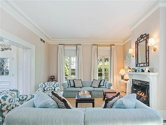 Formal living room looking out to front of home.