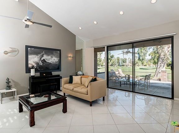 Living room with views and vaulted ceiling