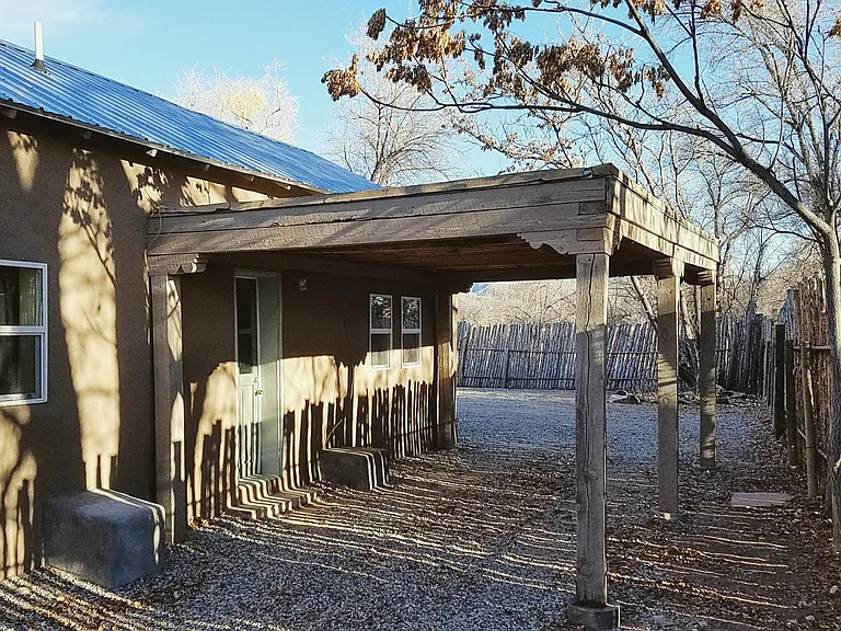 Dedicated carport w/ direct entrance to the Kitchen.