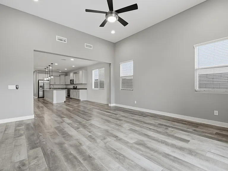 Living room with 12ft ceilings