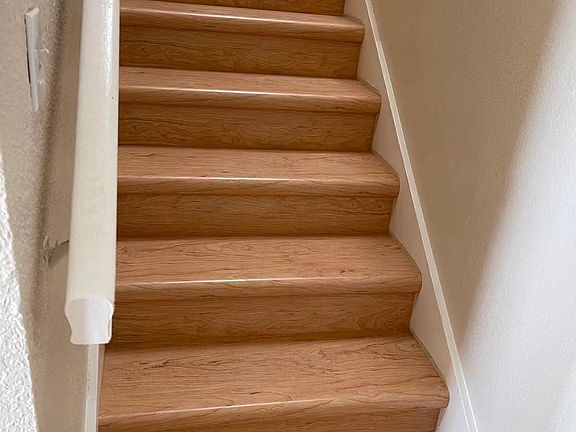 stairs from the living room to upstairs