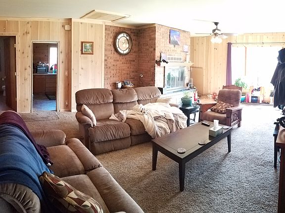 LR with brick fireplace